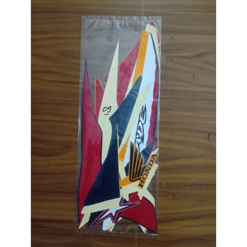 sticker striping Honda Blade Repsol 2009