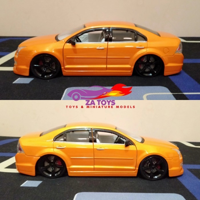 PTS99 Diecast Ford Fusion Repainted Orange Jada Dub City 1:24 Loose (Minus)