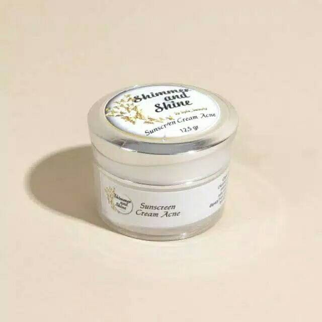 SUNSCREEN ACNE LIGHTENING SHIMMER AND SHINE