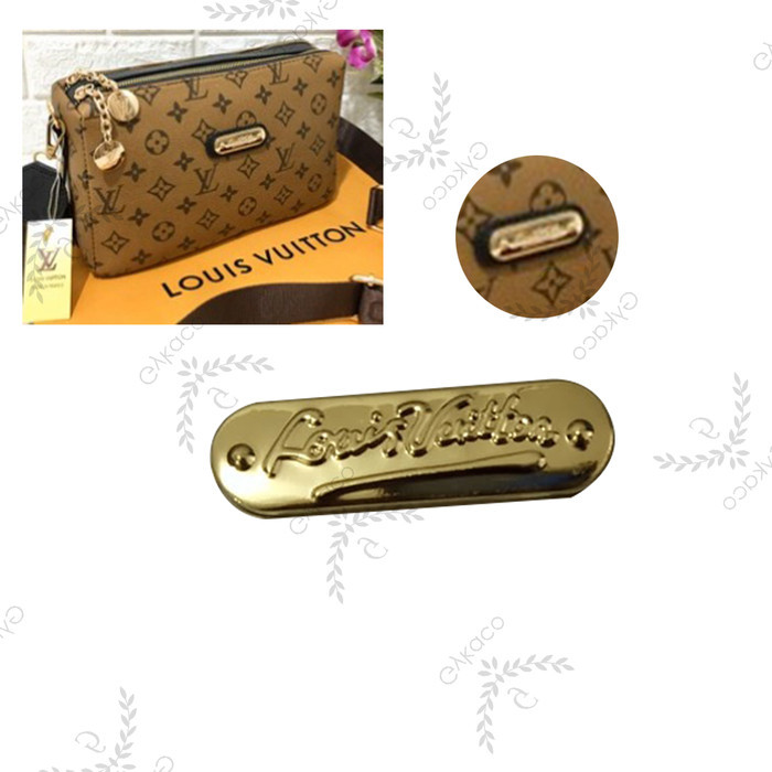 Variasi M025 (Logo Tancap Oval Merek LV)- Aksesoris Tas Fashion IMPORT