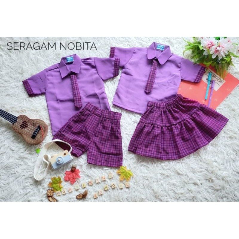 seragam sekolah TK nobita ungu/seragam TK terbaru/seragam PAUD terbaru/seragam sekolah TK murah/sera