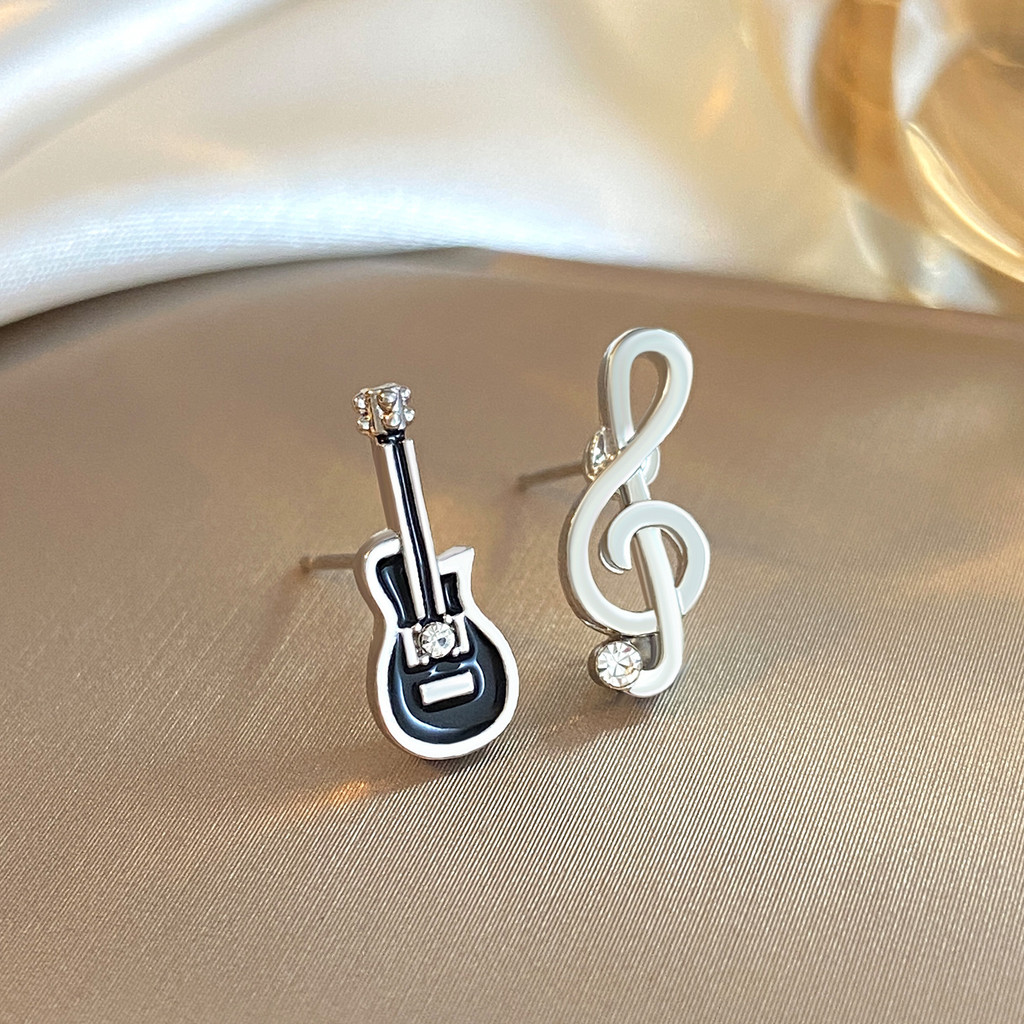 Anting-anting anting pejantan musik gitar angin Eropa dan Amerika, desain temperamen individu merasa