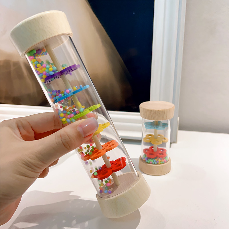 

Montessori Baby Rain Stick Rainbow Hourglass Rain Music Rattle Baby Educational Toy Rainmaker Montessori Sensory Toys for Kids