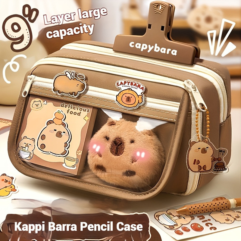 

7 piece set, including a pencil case and doll, 5 stickers, cute pencil box, multi-layer pencil holder, brooch bag
