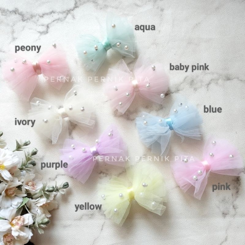 

PITA TULLE MUTIARA SMALL (7X4CM)