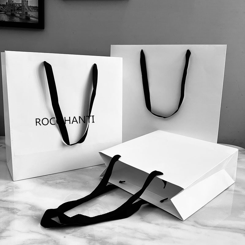 

50pcs Custom luxury craft gift white packaging bolsa de papel printed shopping bag kraft paper bags with your own logo