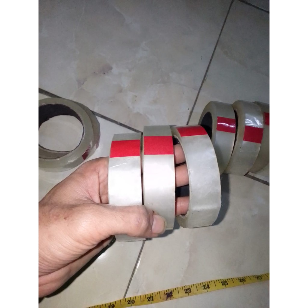 

lakban lebar 2 jari dan 1jari kiloan bening isolasi kecil solasiban