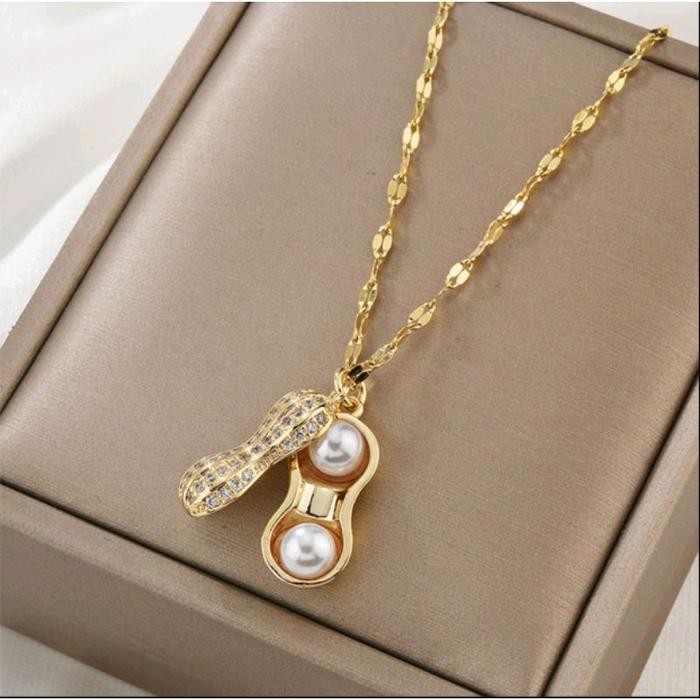 Kalung Melintir Liontin Kacang Emas Asli Kadar 700 Berat 5gram ada surat