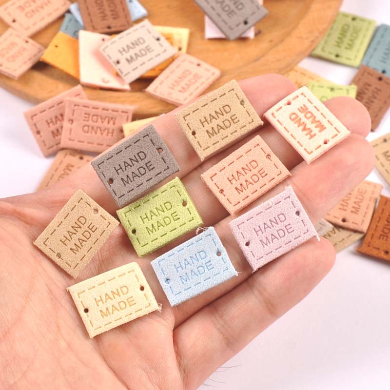 

20Pcs 2x1.6cm PU Cloth Handmade Embossed Tags DIY Flag Label For Garment Sewing Accessories cp3433