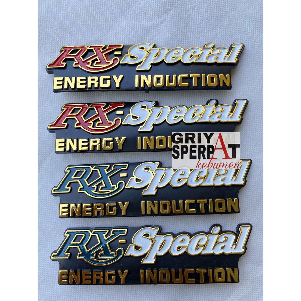 SEPASANG EMBLEM BOK AKI RXS RX SPECIAL KANAN KIRI