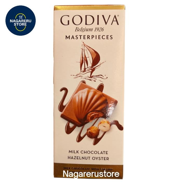 

Godiva masterpieces milk chocolate hazelnut oyster 85gr
