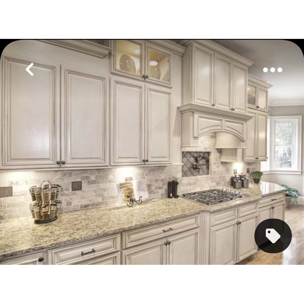 Modern style white kitchen cabinets with kitchen island table