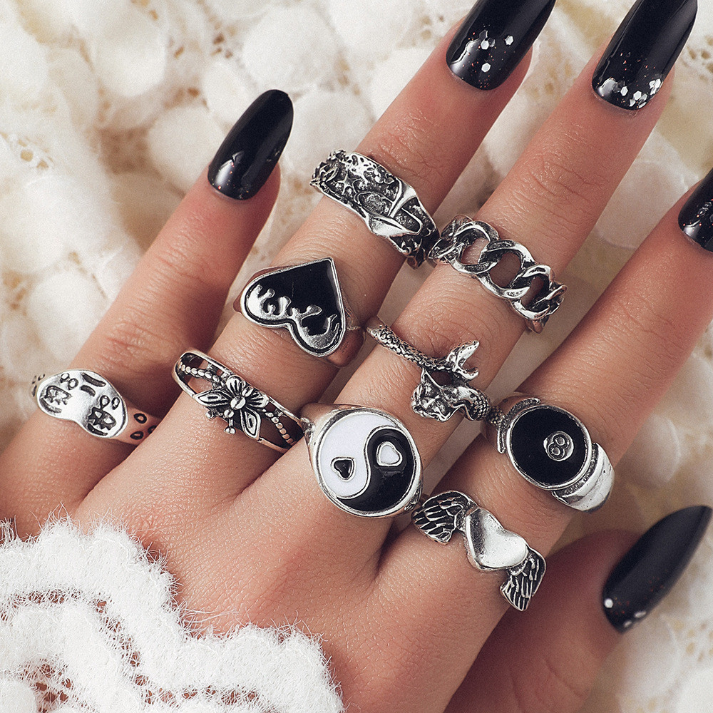 Cincin retro baru cinta hitam nomor 8 sayap rantai kupu-kupu bentuk ular 9 buah set cincin grosir