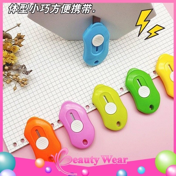 

Cutter Mini Portable Pisau Pemotong Kertas Cutter Sekolah