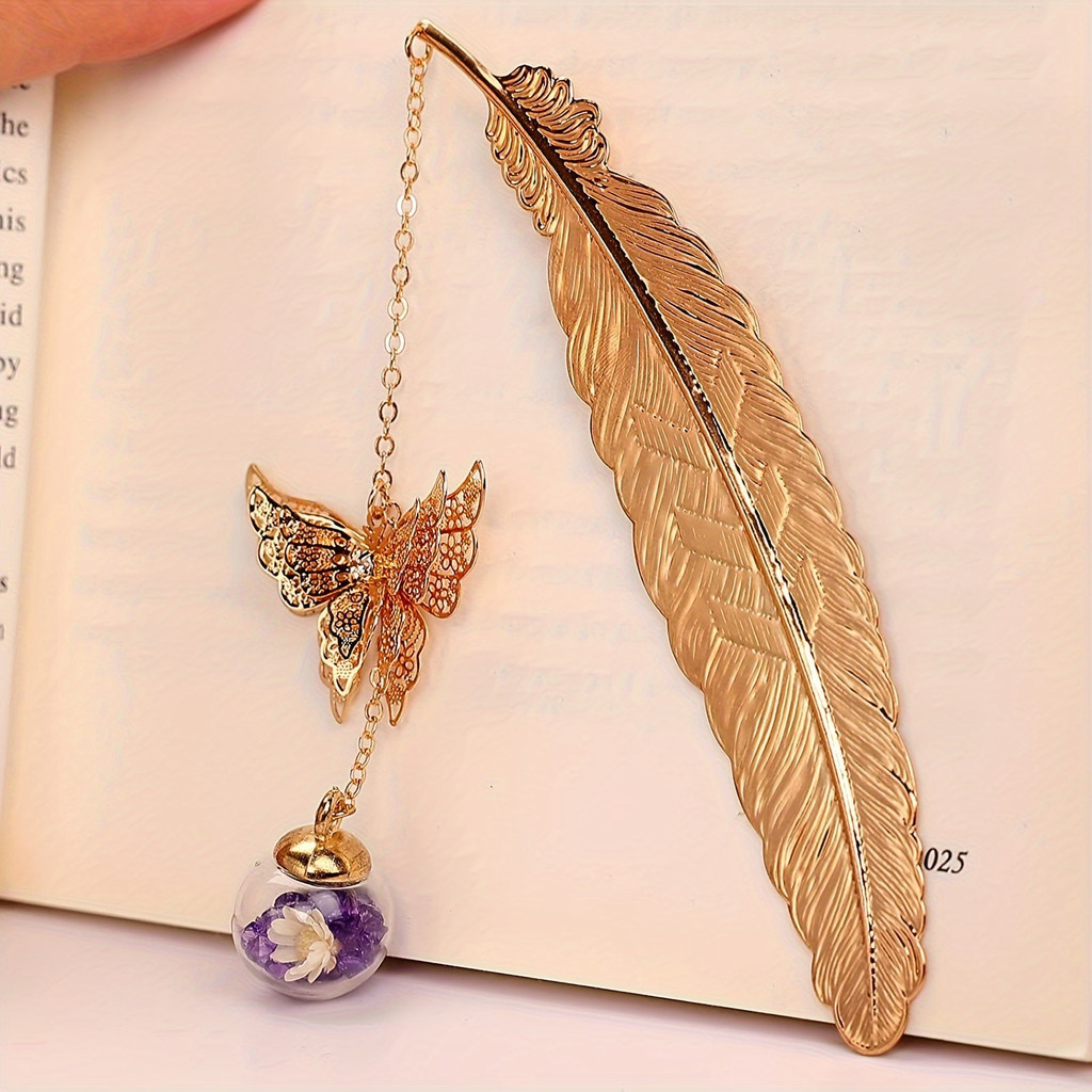 

A gold metal feather bookmark with a 3D colorful butterfly pendant - handmade, suitable for book lovers and home decor