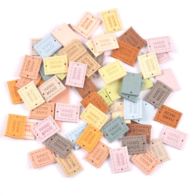 

20Pcs 2x1.6cm PU Cloth Handmade Embossed Tags DIY Flag Label For Garment Sewing Accessories
