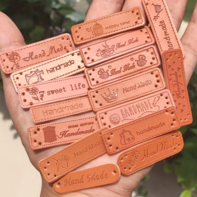 

50PCS PU Leather Labels 5 * 1.5 cm Handmade Label with love Brown Garment DIY sewing tag