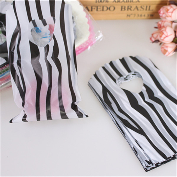 

Fashion Style Wholesale 50pcs/lot 9*15cm Luxury Plastic Gift Packaging Bags Mini Jewelry Gift Bags
