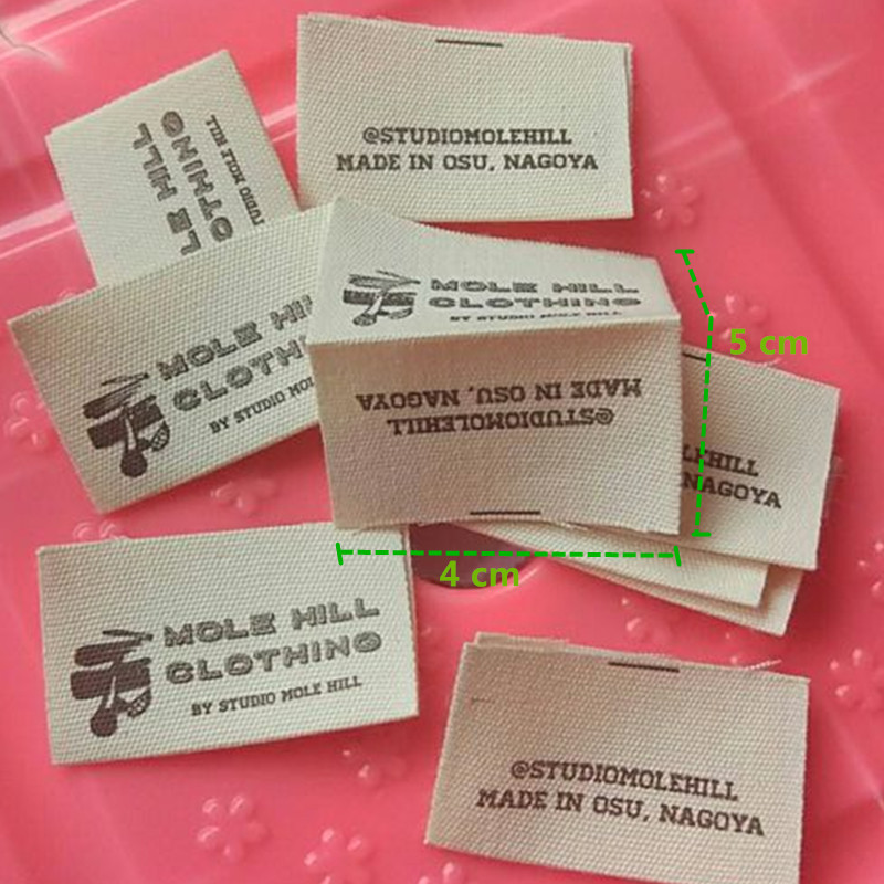 

500pcs Custom Beige coton cloth print label 4 * 5 cm center fold Natural cotton Garment Labels
