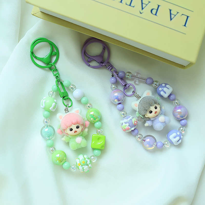 

Kawaii Flocking Dora Big Cousin Anime Keychain,Creative Beaded Mobile Phone Chain,Fashion Bag Pendant, Accessories, Girls Gifts