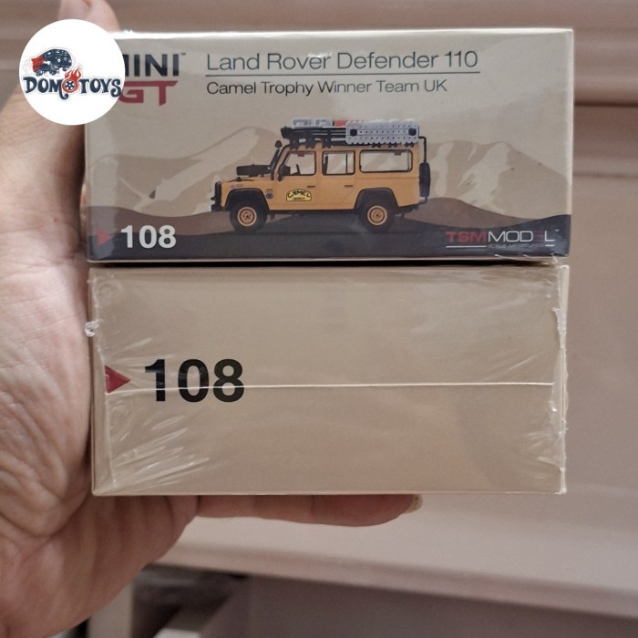 Mini GT Skala 64 Land Rover Defender Camel Trophy  Winner Team UK Clean Version #108