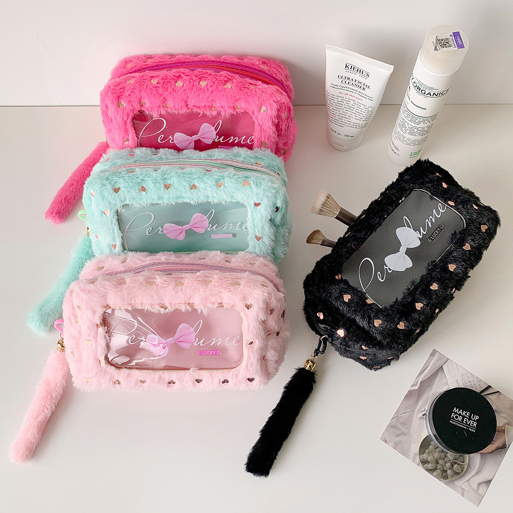 

Korean version candy colored girl plush pencil case, bow shaped stationery storage bag, student carrying makeup bag, toiletry ba