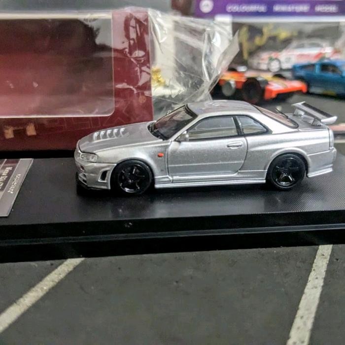 EX99... Diecast MotorHelix Nissan Skyline GTR R34 Nismo Z Tune Silver