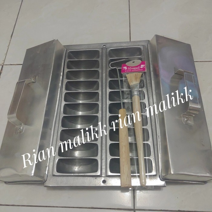 

TERJUAL cetakan kue pukis kue pancong bandros isi 20 lubang bahan alumunium