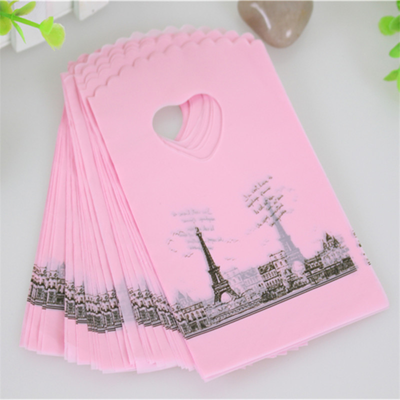 

Hot Sale Wholesale 50pcs/lot Pink Eiffel Tower Packaging Bags Plastic Shopping Bags With Handle Small Gift Bags
