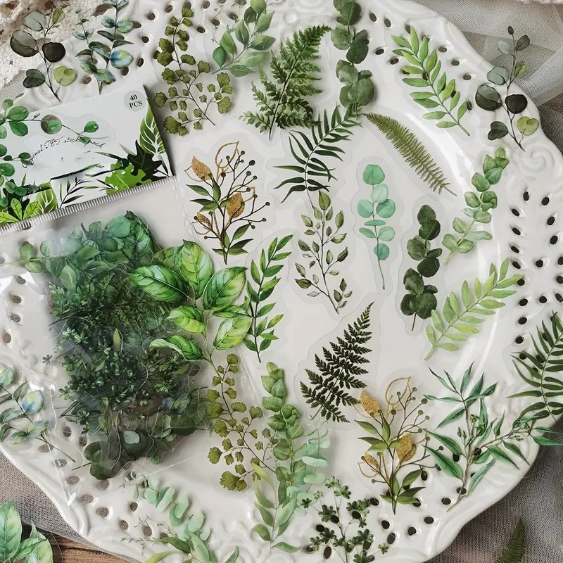 

JIANQI 40Pcs Natural plants Flower Stickers DIY scrapbook PET Material Handbook Water Cup Plant Transparent Sticker