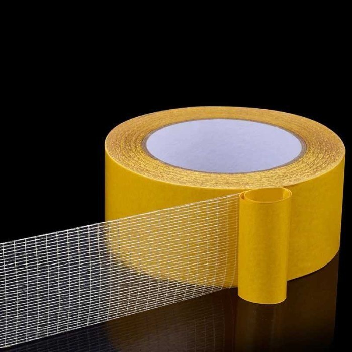 

Lakban Fiber Super Strong Grid Tape Panjang 20 Meter - Transparan, 10 mm - Home Stuff Bandung