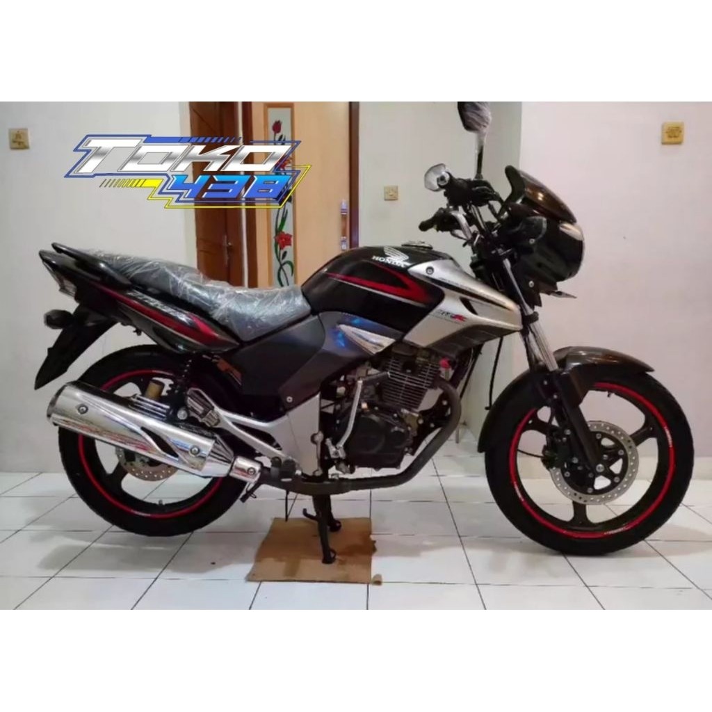 stiker striping terbaik standar montor Tiger Revo tahun 2009 hitam merah biru