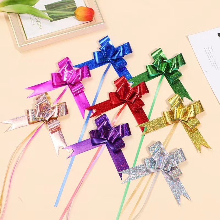 

Pita Tarik Holoram 32 mm Pita Serut Hiasan Parcel Kado Souvenir 30 mm Metalik