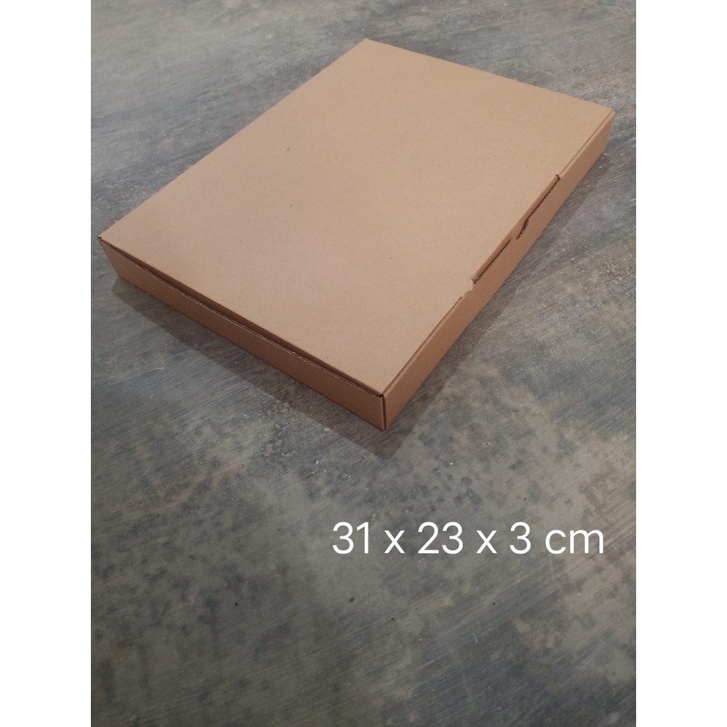

Kardus karton uk.31x 23 x 3cm - Die Cut - kotak baju/ hadiah/packaging/mutlifungsi/dll