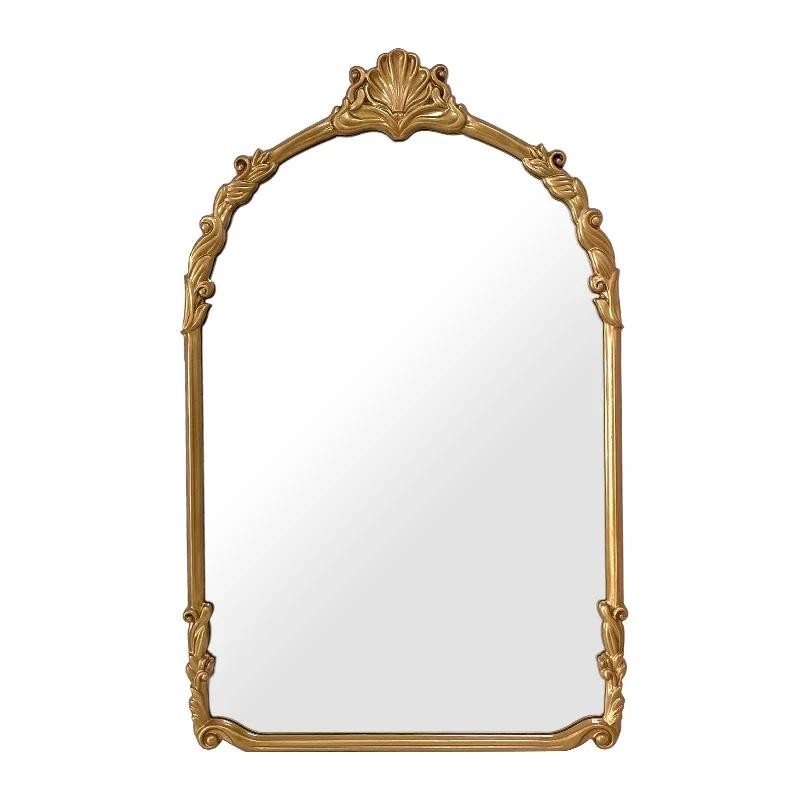 carved decorative mirror, bedroom dresser, mirror, fireplace, wall-mounted wall mirror