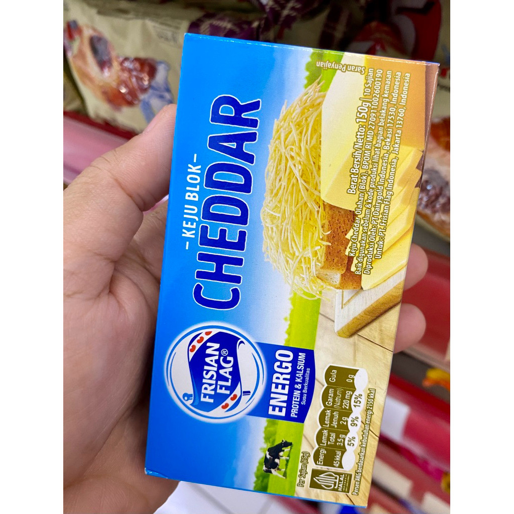 

Frisian Flag Keju Cheddar Blok 150 g - ARM