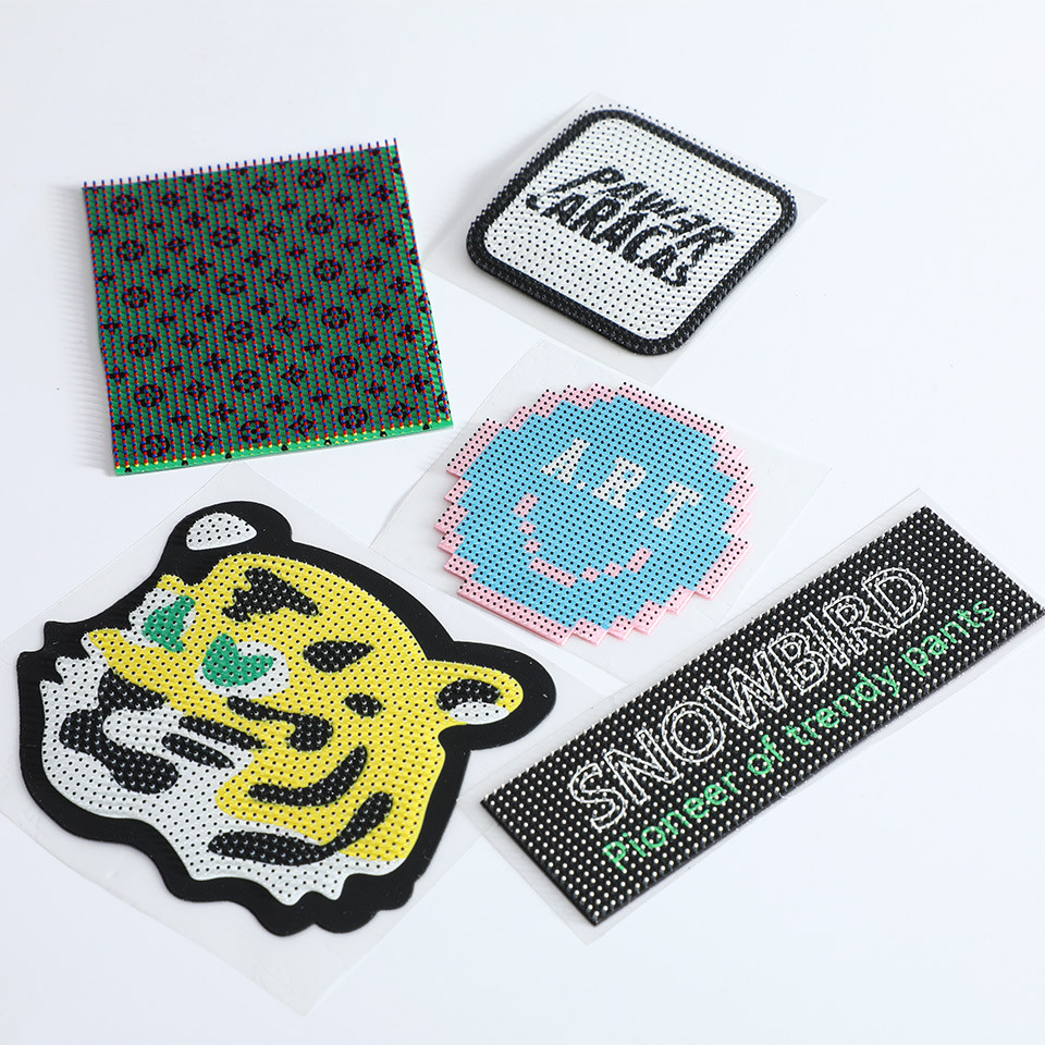 

Custom Brand Logo Silicone 3d Raised Soft Brushes PVC Labels Heat Transfer Rubber Label for Garment