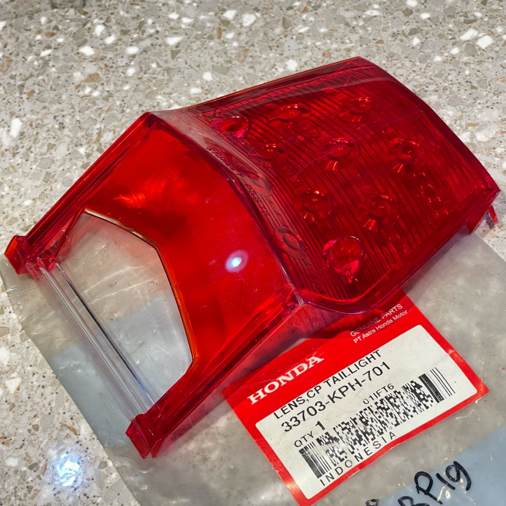 MIKA KACA LAMPU STOP LAMP REM BELAKANG SUPRA X 125 OLD LAMA ORIGINAL AHM 33703 KPH 701