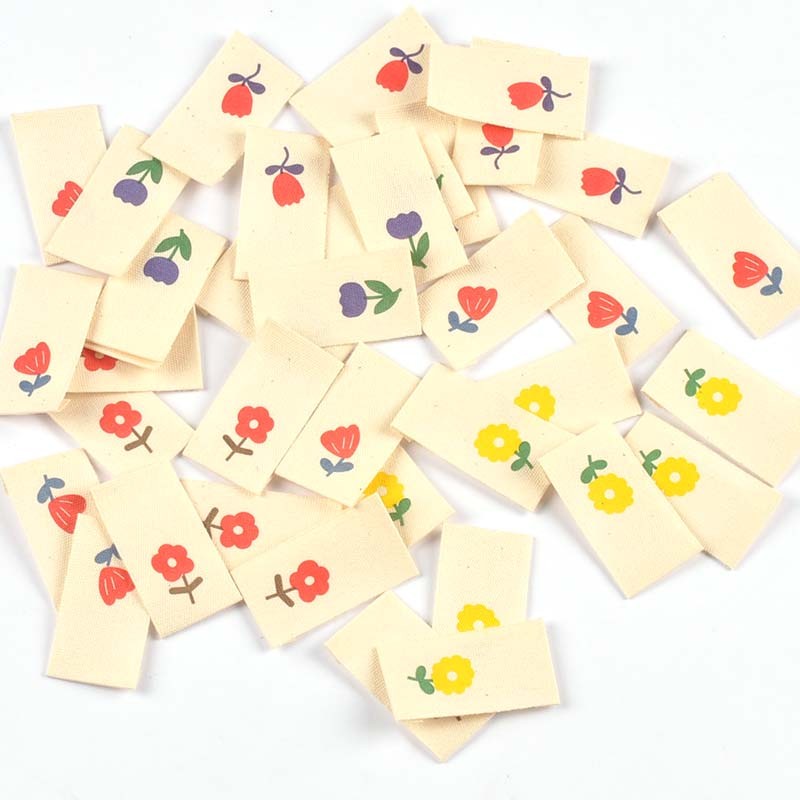 

50pcs Colorful flower Printed Labels For Garment Sewing Accessories DIY Handmade Hats Bags Crafts Supplies Clothing Tags c3616