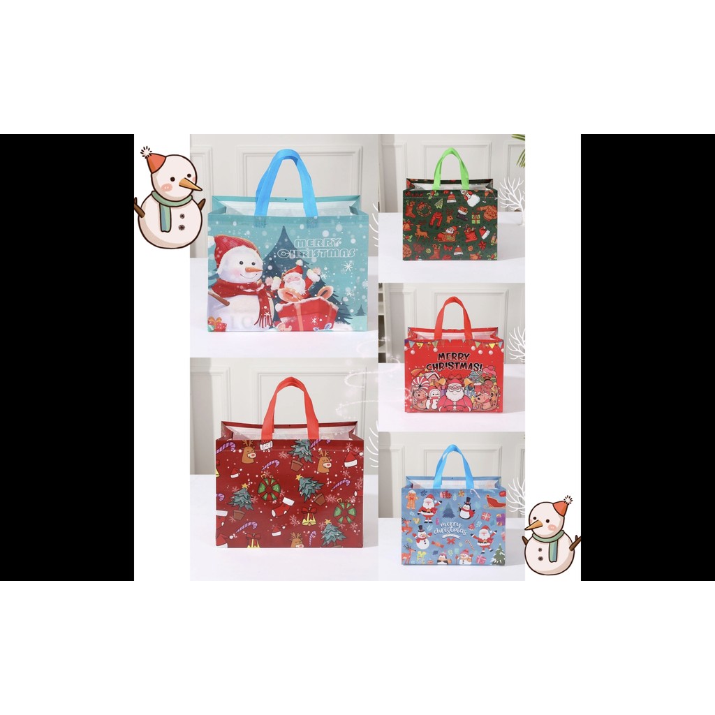 

TAS SPUNBOND MOTIF CHRISTMAS / GOODIE BAG SPUNBOND EDISI NATAL / SPUNBOND BAG CHRISTMAS / TAS GAMBAR SANTA