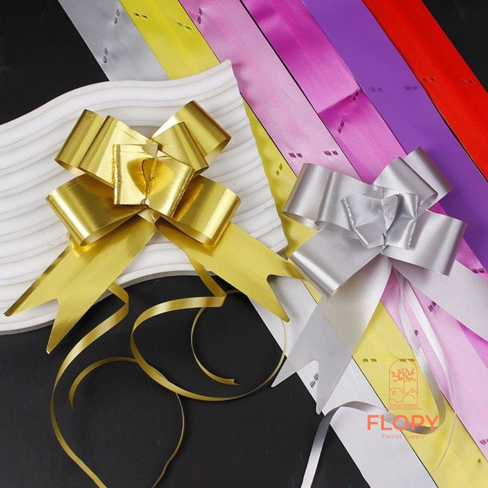 

Pita Kado / Pita Tarik Jumbo Panjang / Pita Tarik Warna