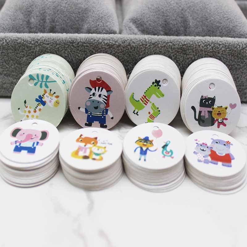 

Gift Tags100pcs 100string Lovely Lion /Dino /elephant /Giraffe Cartoon Hang Tags Baby Shower Party Gift Box Wrapping Label Card