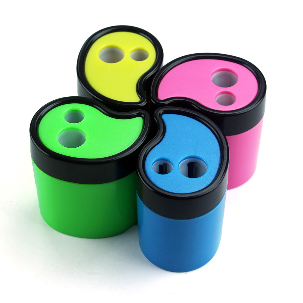 

Candy-colored comma-shaped double-hole handheld pencil sharpener with built-in waste bin