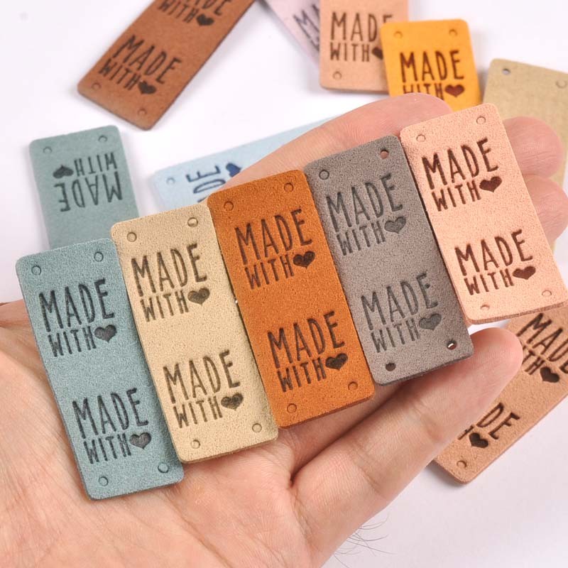 

20Pcs 2x5cm PU Cloth Handmade Embossed Tags DIY Flag Label For Garment Sewing Accessories cp3470