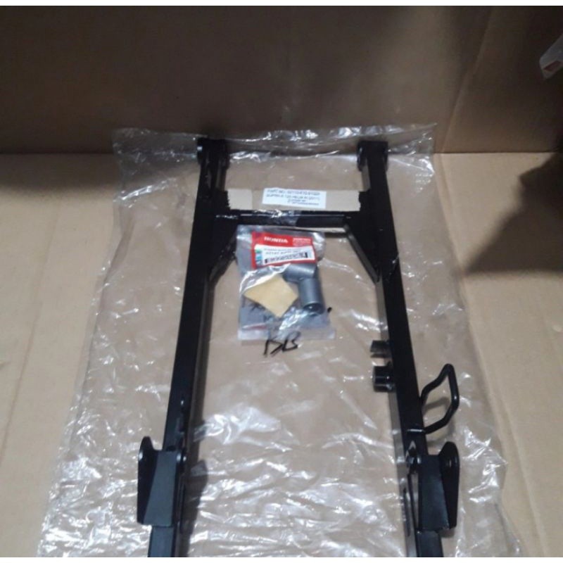 swing arm supra x 125 helm in