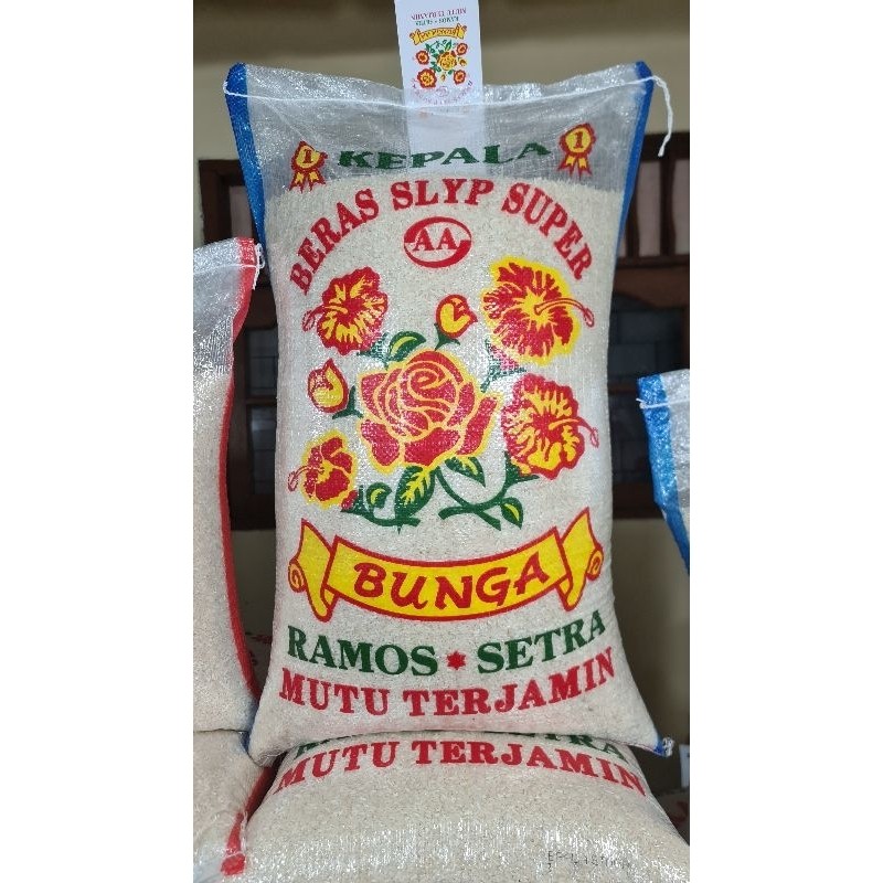 

Beras Pulen Enak Cap Bunga Ramos Setra Super