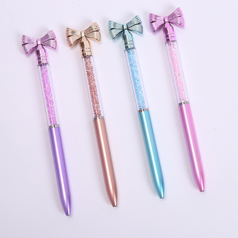 

5Pcs/Lot Cute Bowtie Rotating Ballpoint Pen Blue Ink Writing Oil Pens Crystal Flowing Sand Diamond School Office Supplies Gift
