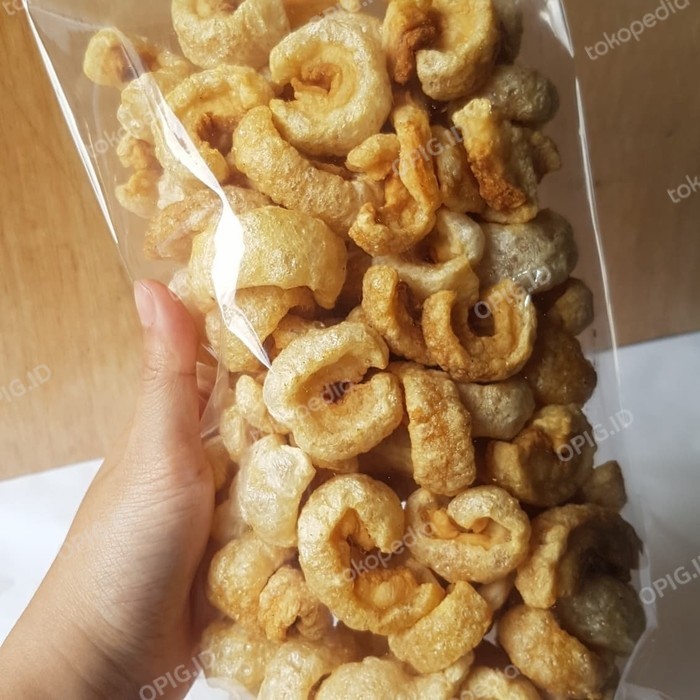 

BEST SELLER kerupuk kulit babi/krubi/kerupuk kulit babi samcan opig 250gr - Asin