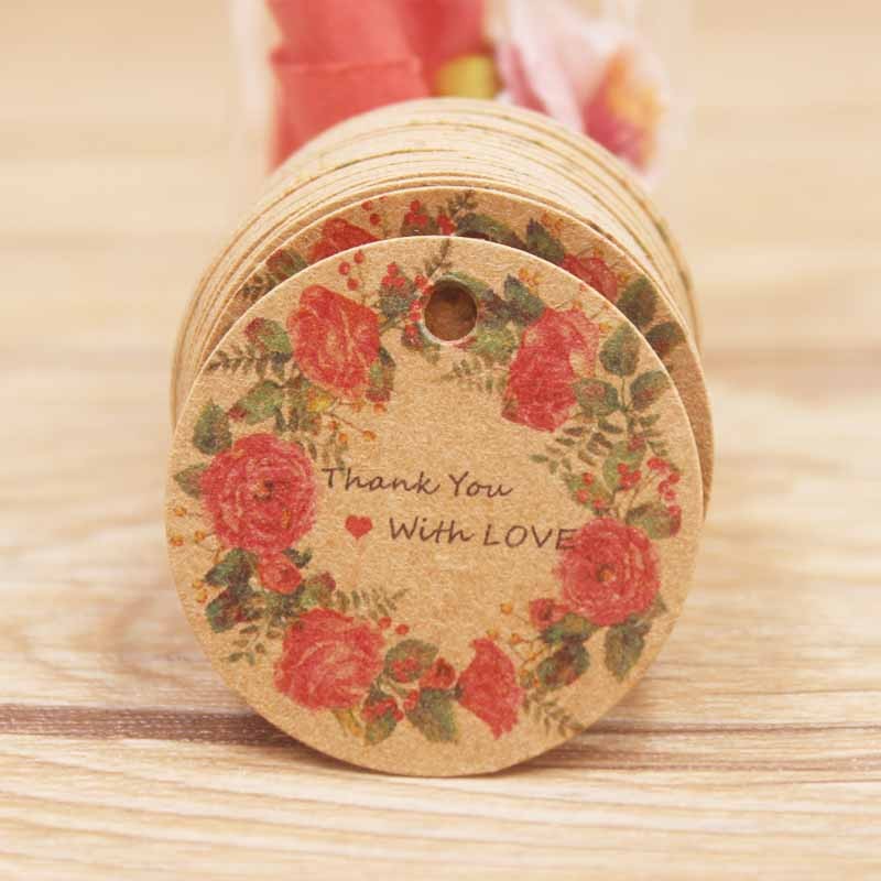 

100pcs circlr tag Newest design Hand with love around flower design labels tag hot selling 300g high-quality hot selling tag
