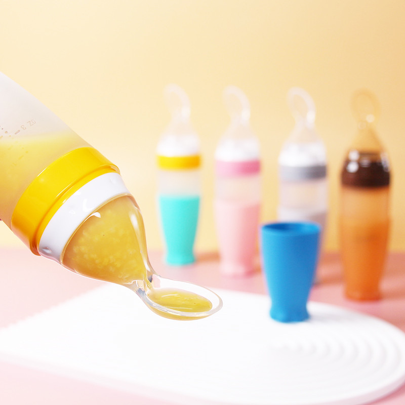 1 Pcs Baby Rice Cereal Bottle Dropper Feeding Squeeze Spoon Soft Silicone Spoon Cute Rocket Shape So